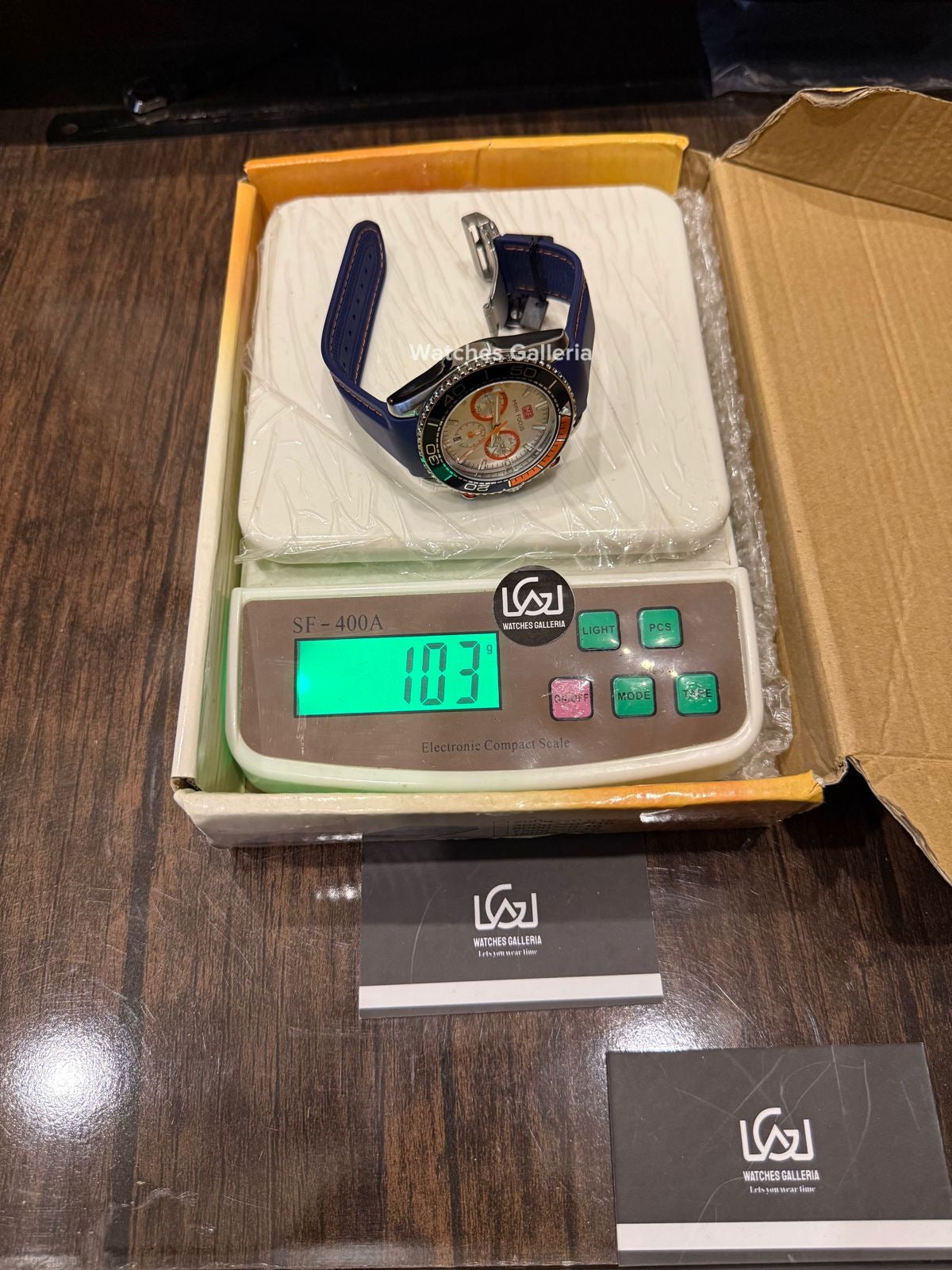 Mini Focus Speedmaster Planet Ocean Quartz (Blue/Orange) MF0426G01 Watches Galleria