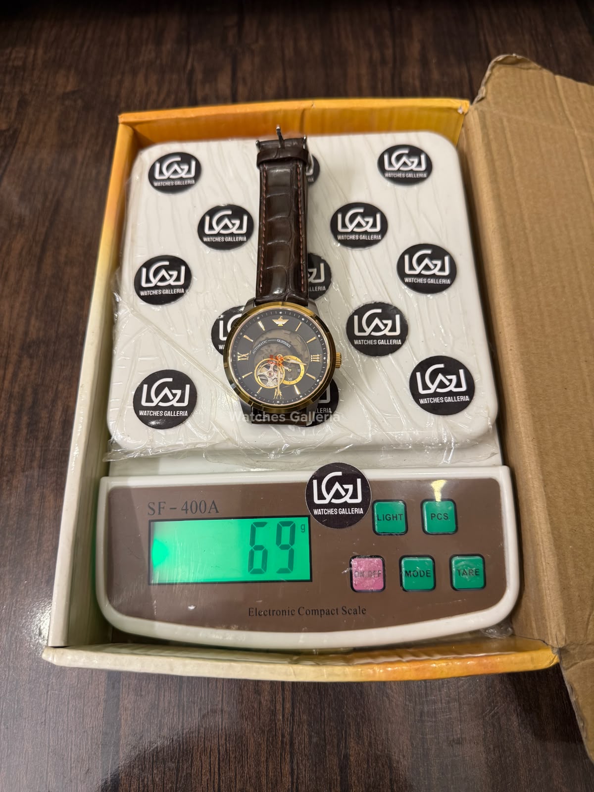 Oupinke G3190 (Brown Leather) Open Heart Automatic Watch with Miyota 8215 Japanese Movement, Sapphire Crystal, Luminous Dial & Black Leather Strap